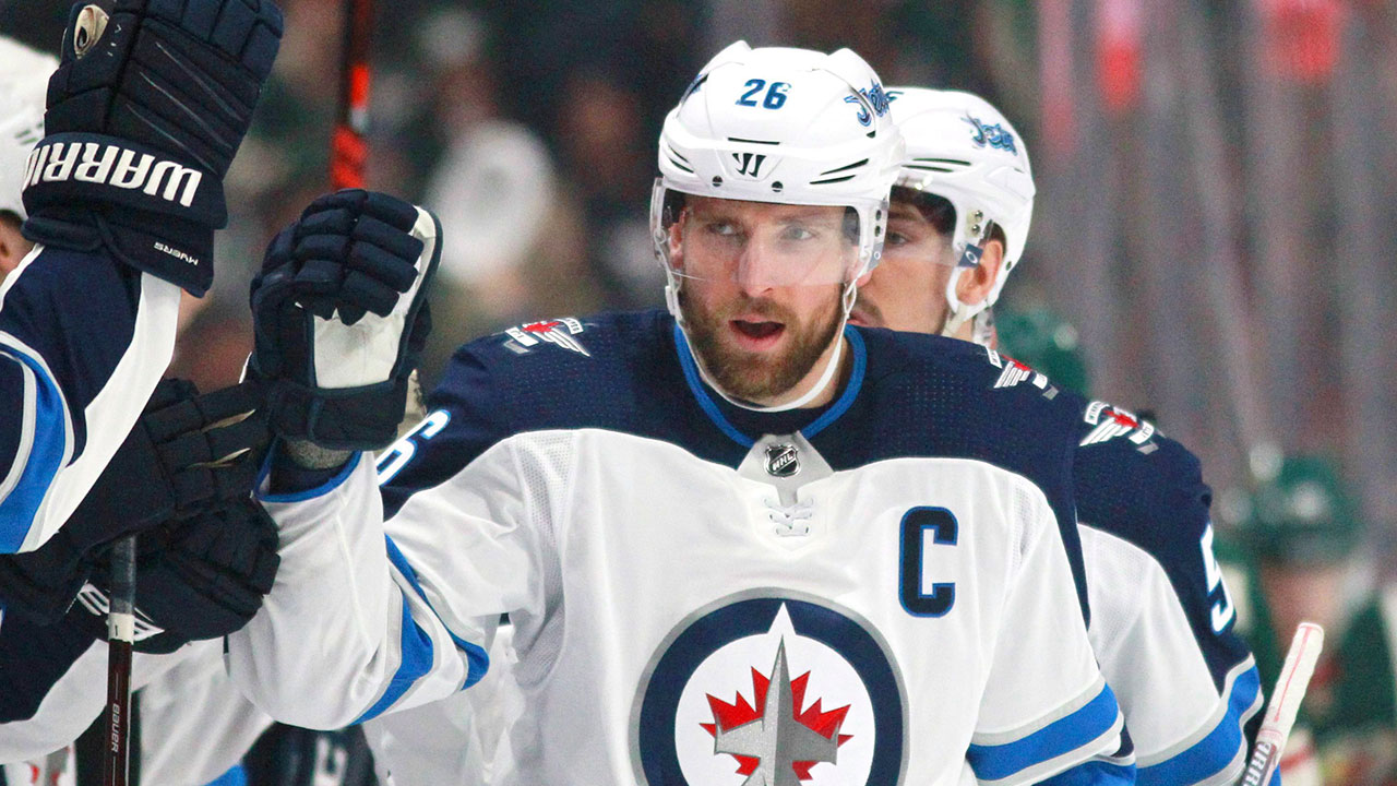 Wheeler's two-point night helps Jets beat Flames i