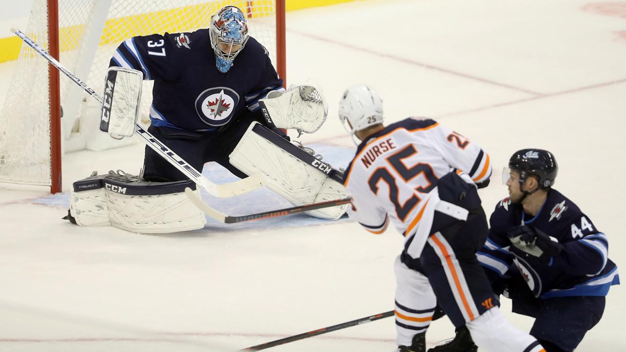 McDavid records goal, assist as Oilers rally past Jets 4-2