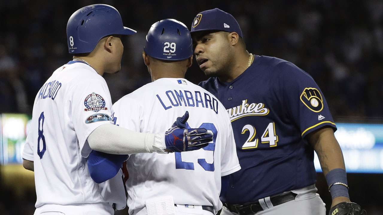 MLB fines Dodgers' Machado for running into Brewers' Aguilar