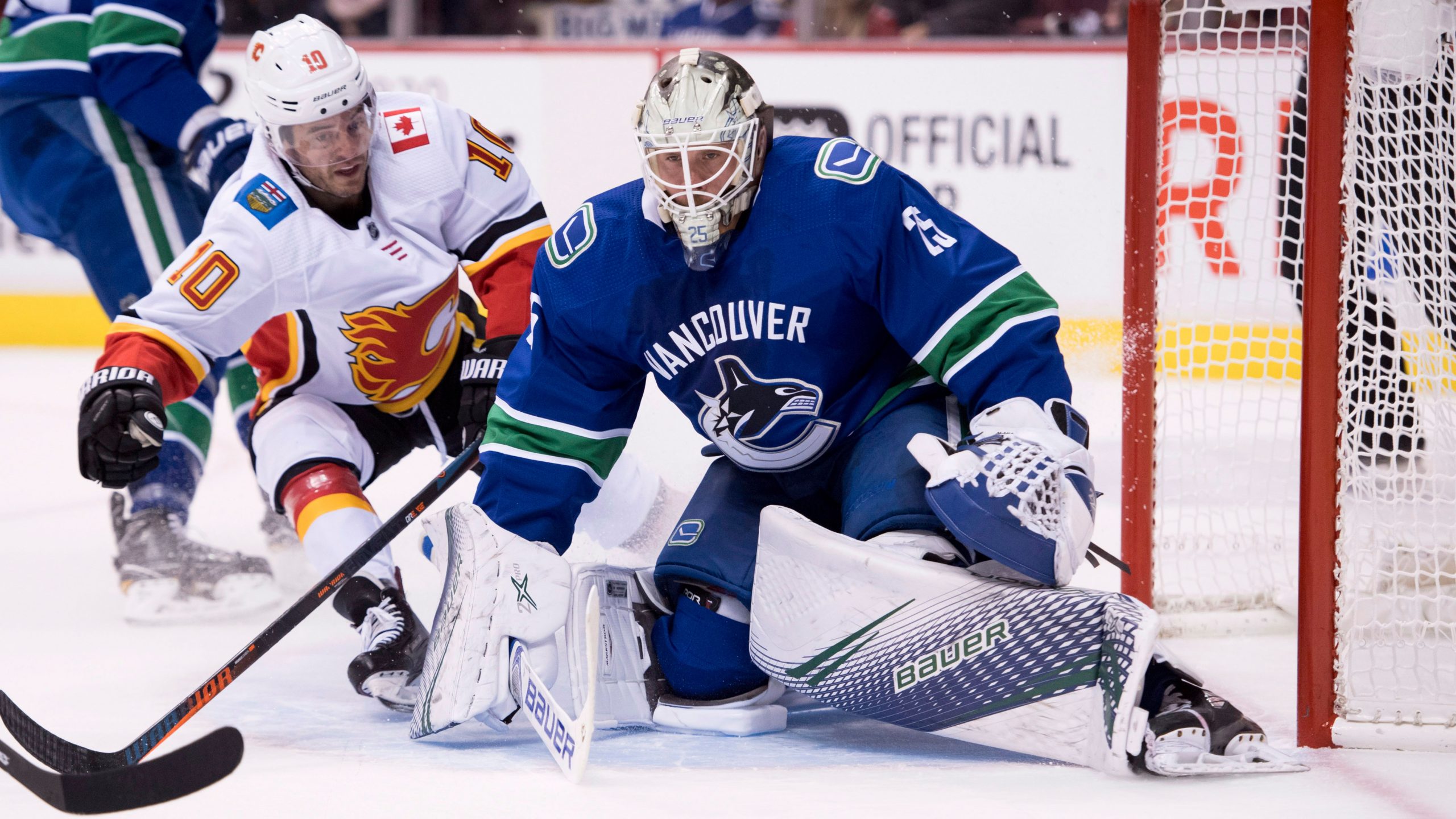 Pettersson Dazzles, Leads Canucks Past Flames In NHL Debut