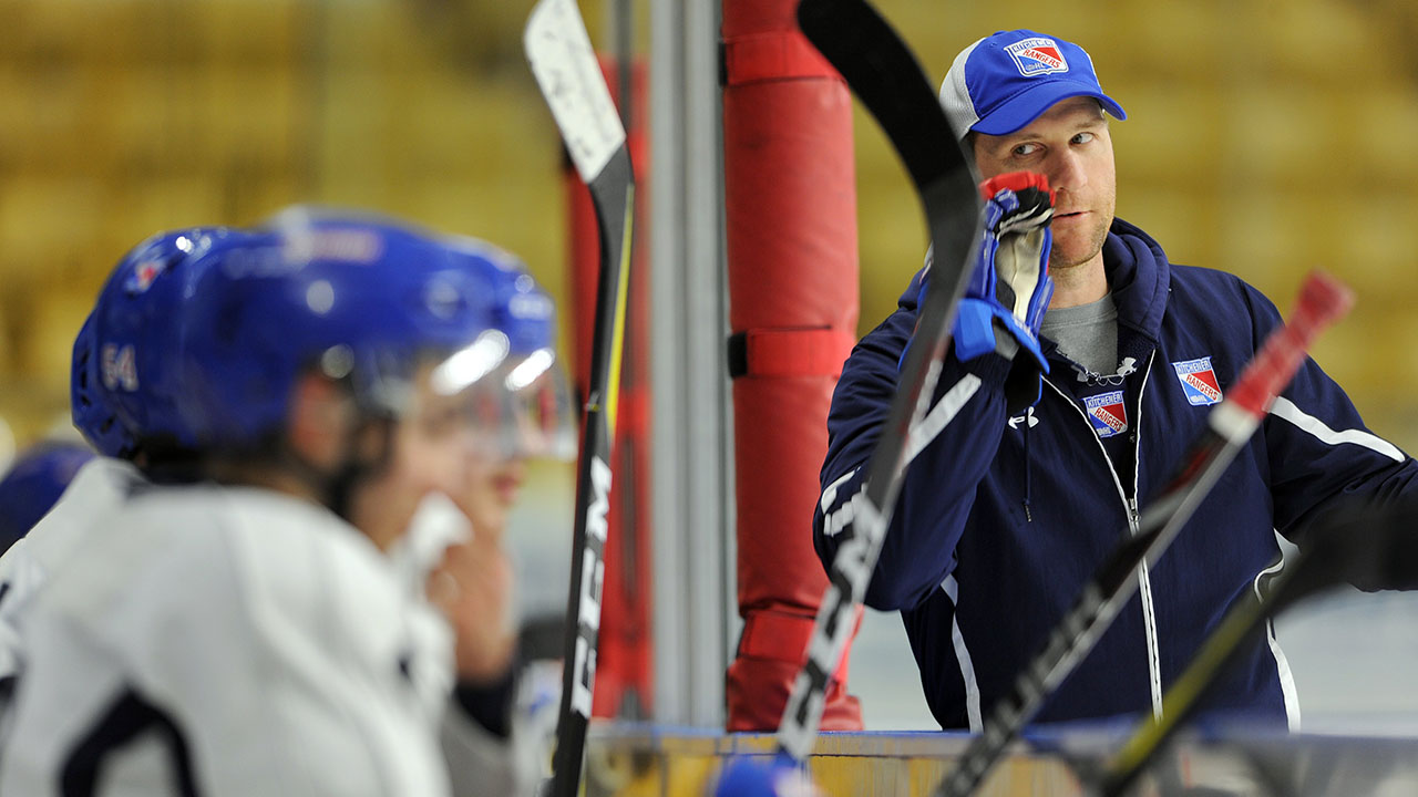 Kitchener-Rangers-assistant-coach-Dennis-Wideman-talks-to-players-during-practice