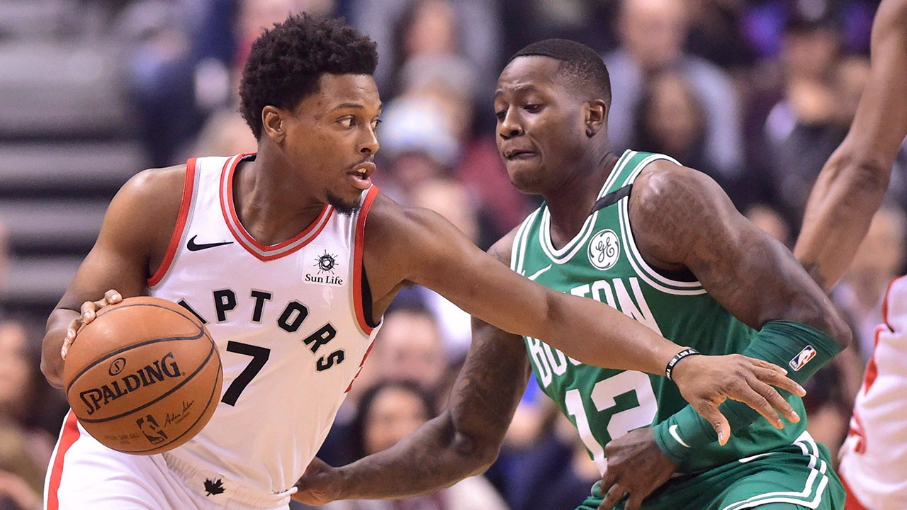 kyle_lowry_looks_to_dribble_past_terry_rozier