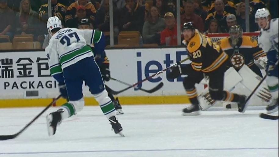 Canucks and Bruins score eight goals in wild secon
