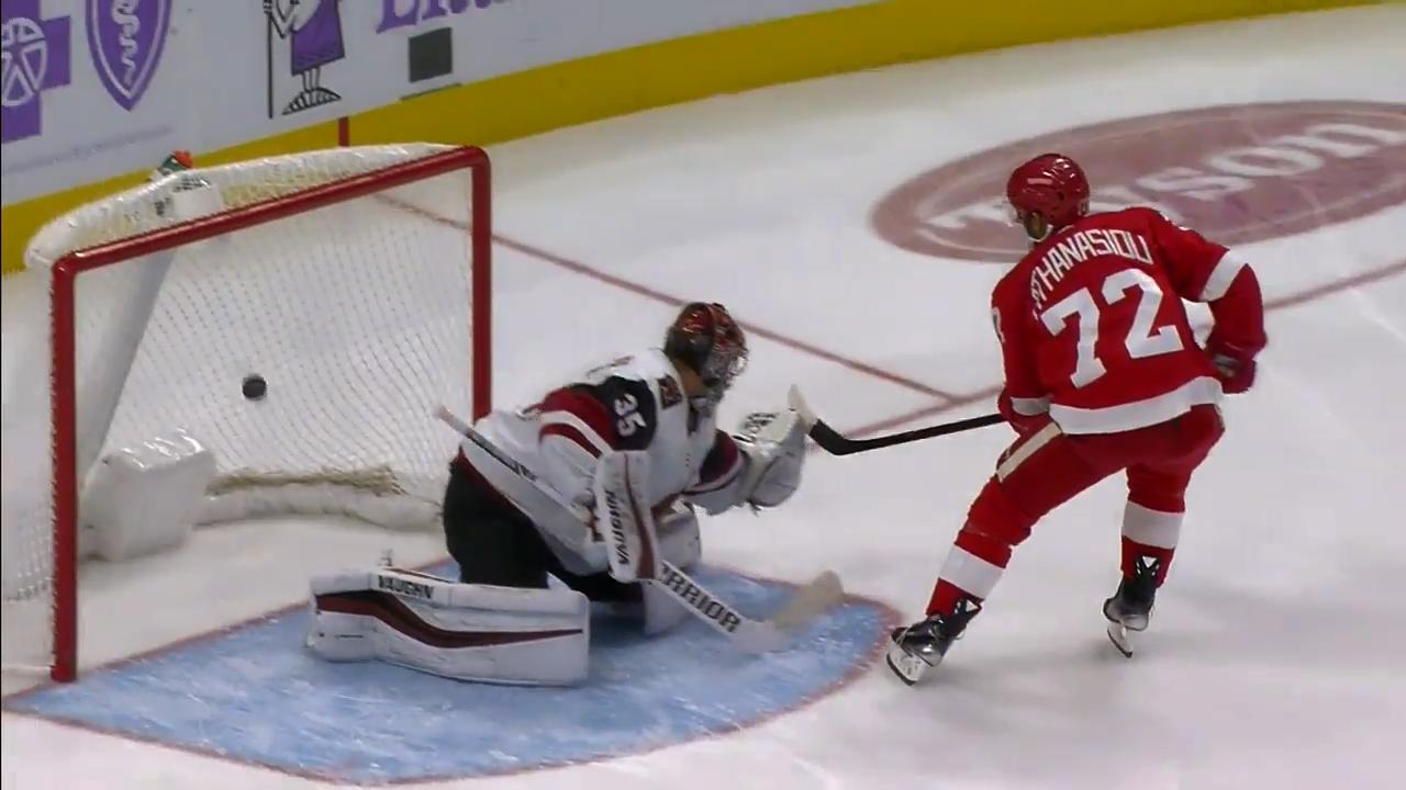 Athanasaiou chases Kuemper from net with a backhan