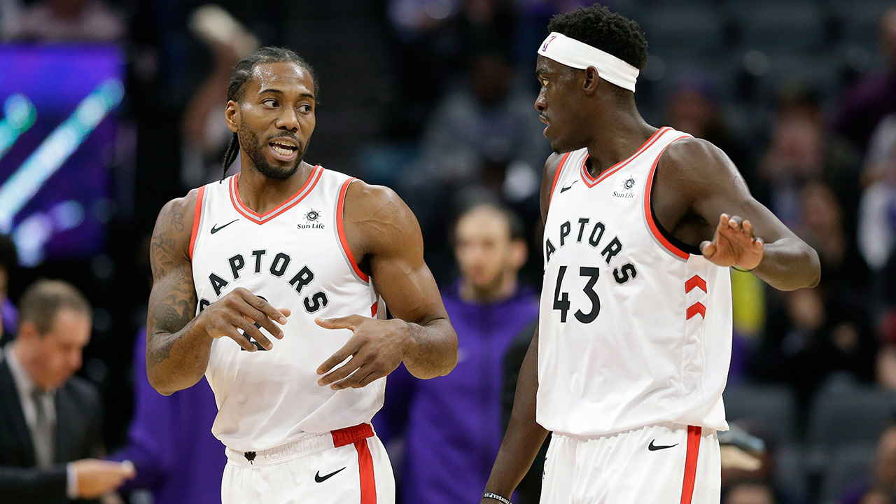 NBA-Raptors-Siakam-and-Leonard-during-game-against-Kings