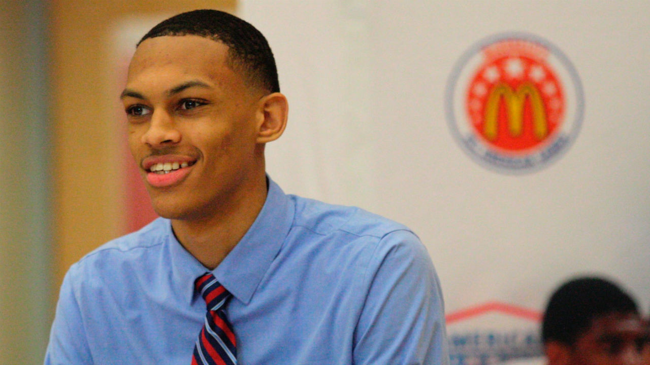 In-this-Feb.-20,-2018-photo,-Princeton-High-School-senior-Darius-Bazley-smiles-before-he-was-presented-with-his-McDonald's-All-American-Game-jersey.-Others-have-taken-the-straight-line-approach-from-high-school-to-the-NBA-development-league.-But-Bazley's-intention-to-spend-a-season-in-the-NBA-G-League-rather-than-a-sham-couple-of-semesters-in-the-classroom-should-be-the-catalyst,-once-and-for-all,-to-eliminate-the-silly-one-and-done-rule.-(Adam-Baum/The-Cincinnati-Enquirer-via-AP)