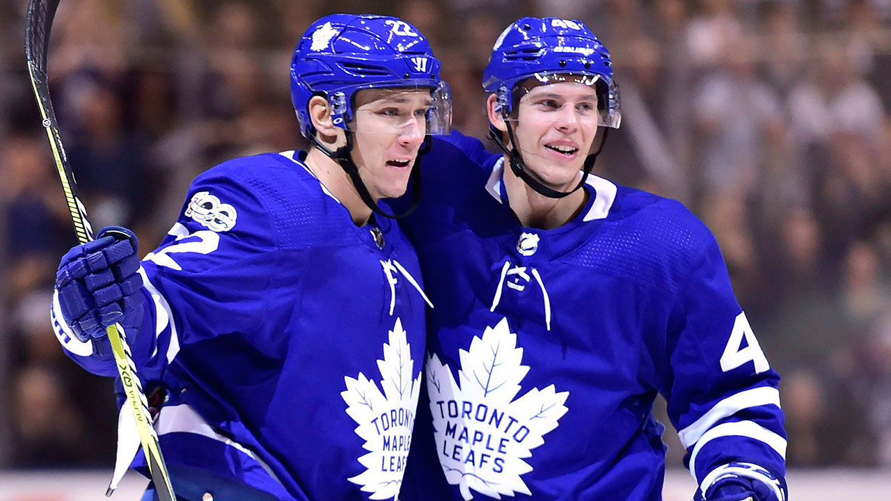 NHL-Maple-Leafs-Calle-Rosen-celebrates-goal-with-Nikita-Zaitsev