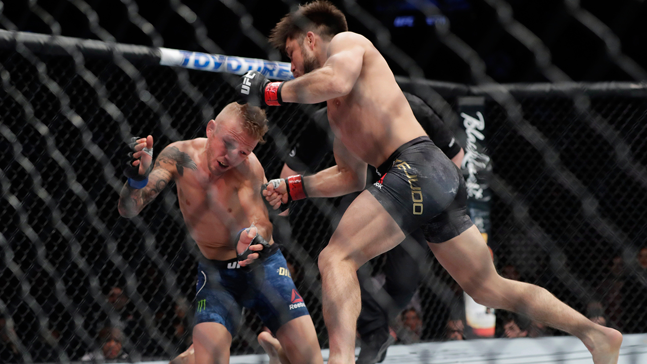 Cejudo defends 125-pound belt with record win over Dillashaw