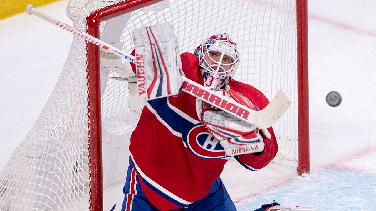 NHL-Canadiens-Niemi-stops-puck-against-Panthers