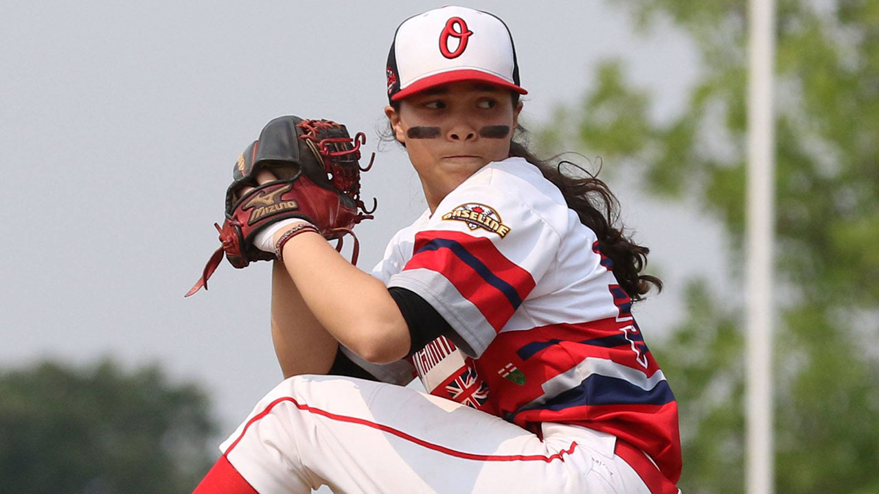 caitlin-tomotsugu-throws-a-pitch