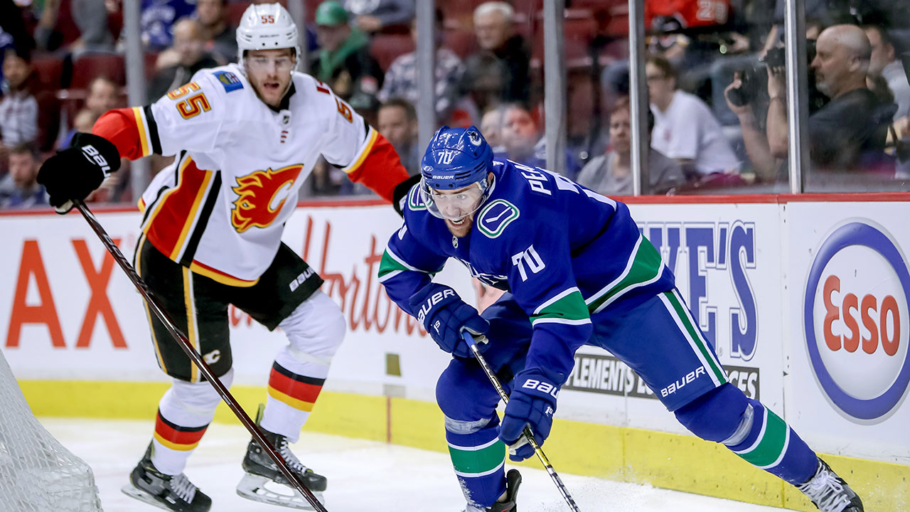 Giordano tallies three points, leads Flames to win