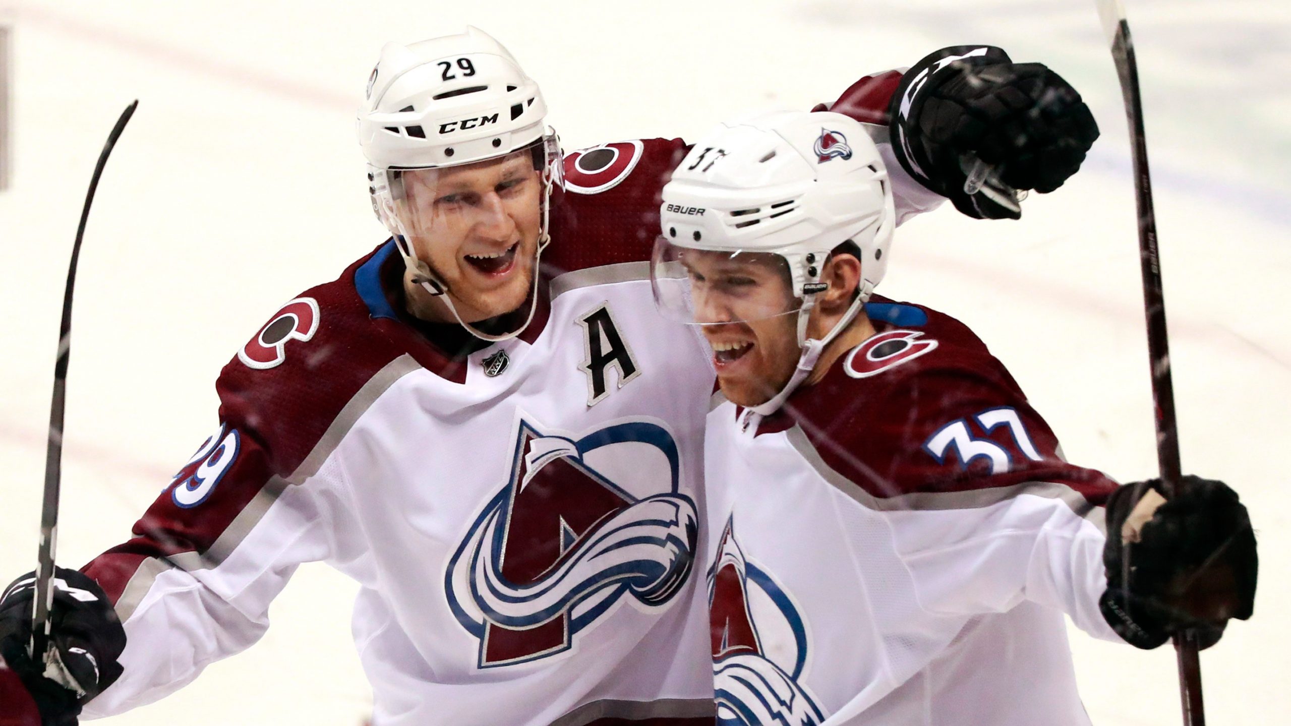 MacKinnon scores in OT as Avalanche top Flames to 
