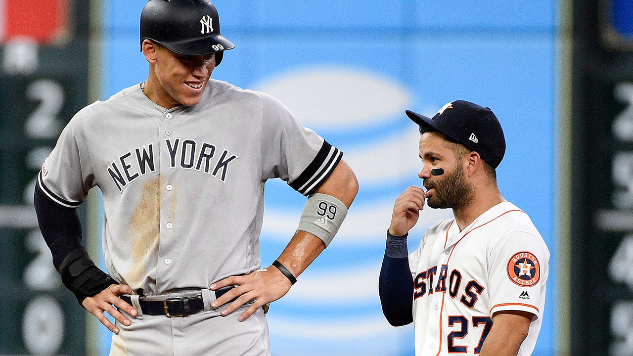 Jose Altuve had a little help posing for a picture next to Aaron Judge