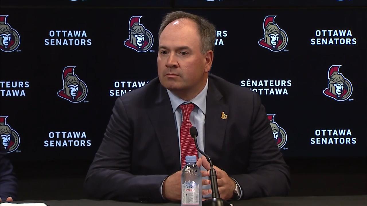 Head coach D.J. Smith embraces Senators Pride Night