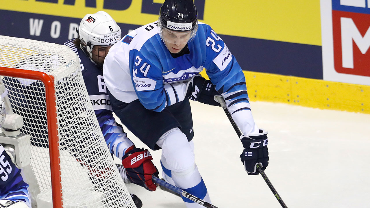 kaapo-kakko-defends-puck-from-jack-hughes