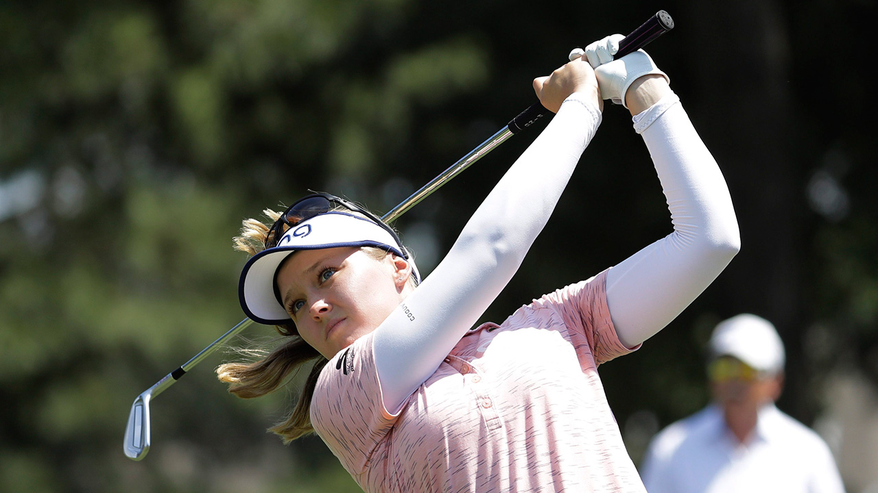 Brooke Henderson records hole-in-one just before darkness halts play