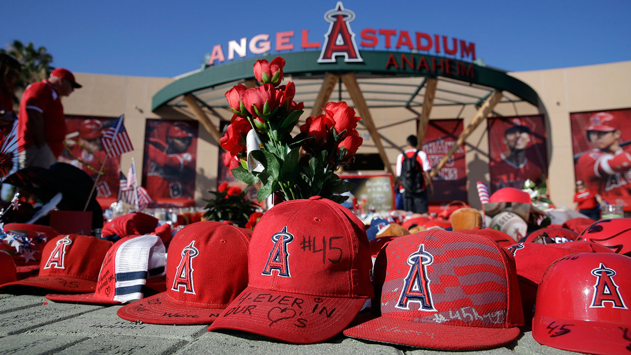 Los Angeles Angels bring Tyler Skaggs' jersey onto the field and