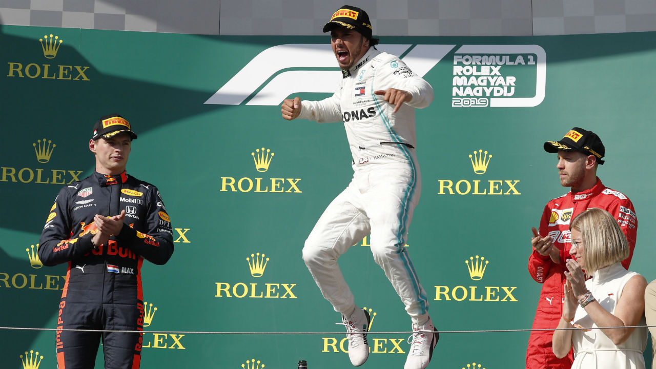 Lewis Hamilton overtakes Verstappen late on to win Hungarian GP