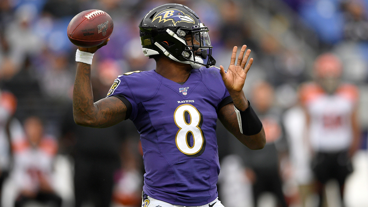 Baltimore Ravens quarterback Lamar Jackson looks to pass against the  Cincinnati Bengals during the first half of a NFL football game Sunday,  Oct. 13, 2019, in Baltimore. (AP Photo/Nick Wass Stock Photo 