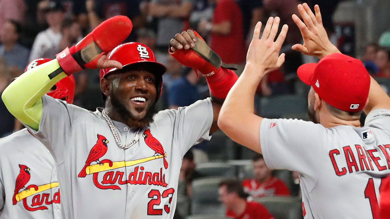 Cardinals score four runs in ninth, hold off Braves in NLDS opener