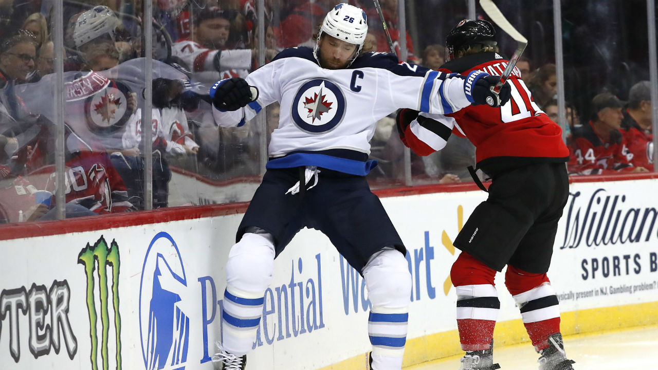 Jets rally from four-goal deficit to beat Devils i
