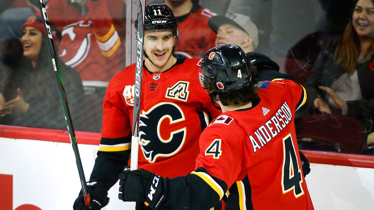 Hanifin's three point night helps Flames top the Devils