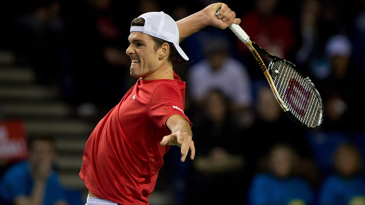 canadas-frank-dancevic-returns-against-spain-in-davis-cup