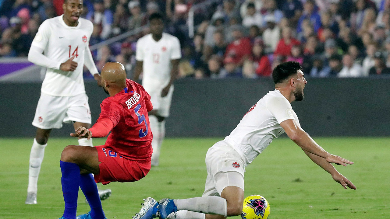 john-brooks-and-lucas-cavallini-during-canada-us-soccer-match