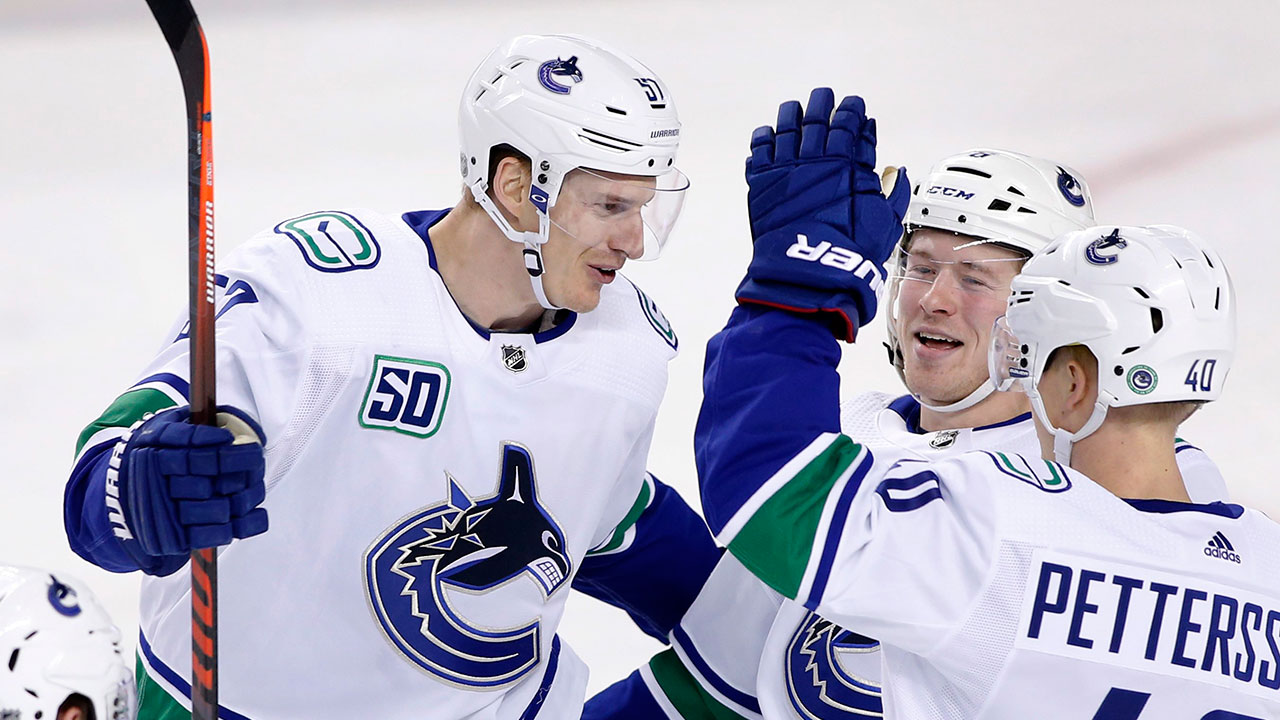 Tyler Myers's two-goal performance leads Canucks p