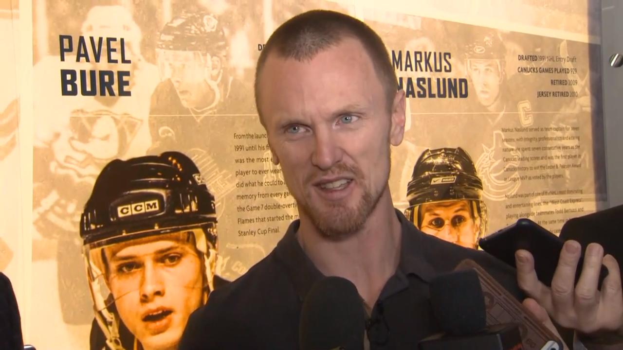 Canucks retire the Sedin twins' jerseys 