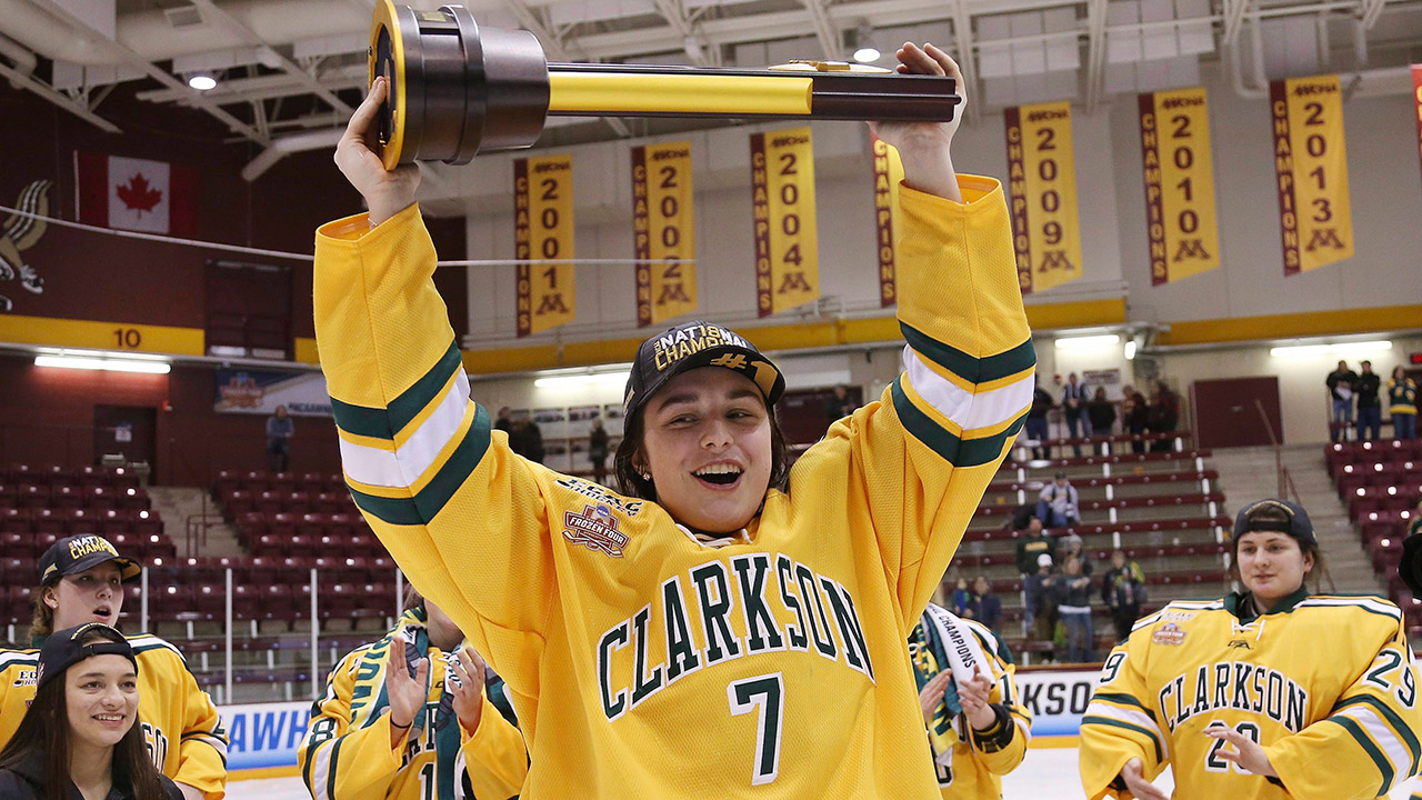 clarksons-elizabeth-giguere-holds-up-trophy