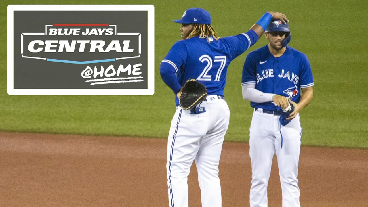 TORONTO, ON - APRIL 11: Toronto Blue Jays first baseman Vladimir Guerrero  Jr. (27) poses for the cameras after the opening ceremony pitch from Former Blue  Jays first baseman and recent Hall