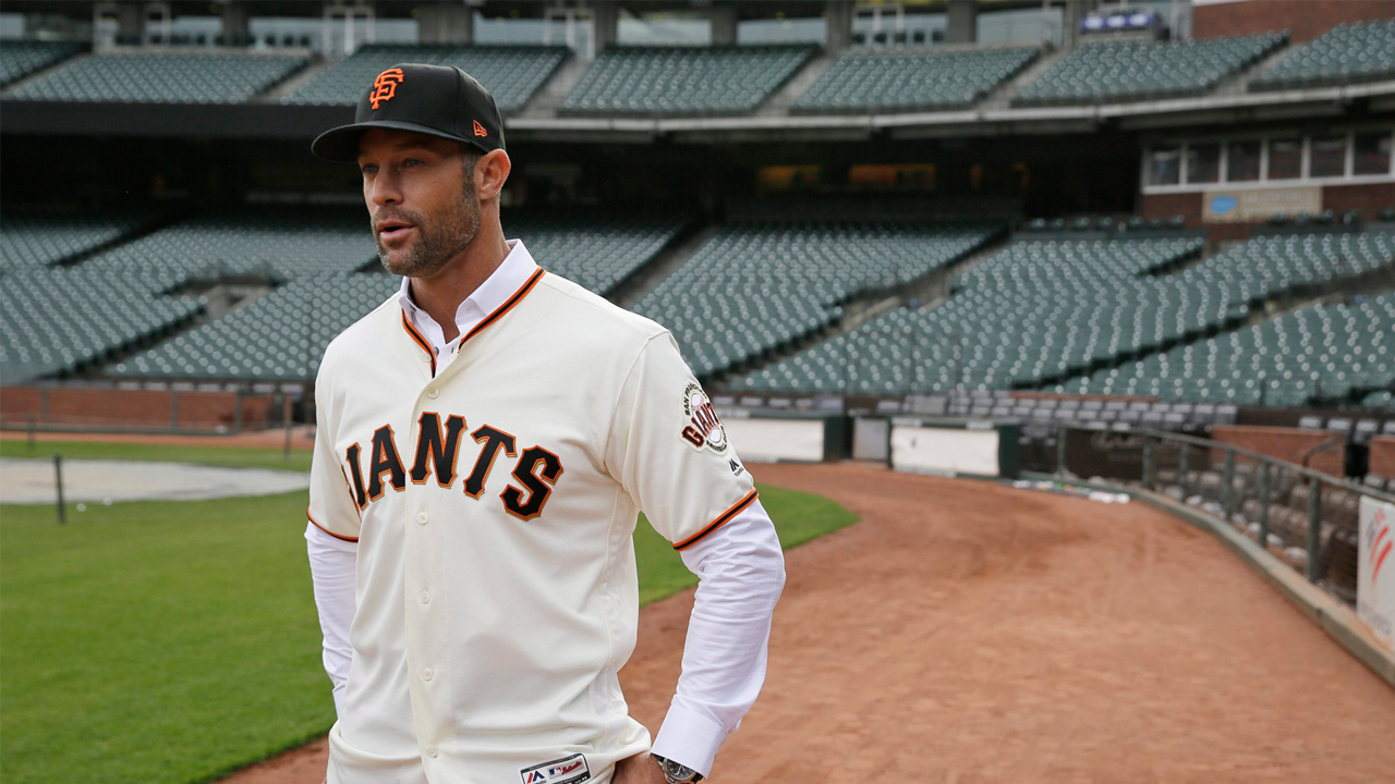 San Francisco Giants players, manager Gabe Kapler kneel during anthem