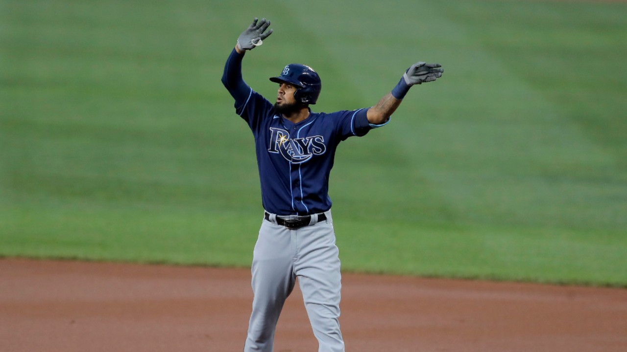 Tampa Bay Rays' Jose Martinez reacts after hitting a single to right field off Baltimore Orioles starting pitcher Wade LeBlanc during the first inning of a baseball game, Saturday, Aug. 1, 2020, in Baltimore. (AP Photo/Julio Cortez)