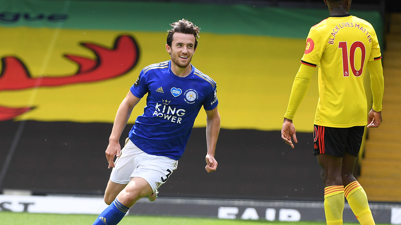 Ben Chilwell, left, celebrates after scoring Leicester's opening goal during the Premier League match between Watford and Leicester City at the Vicarage Road Stadium in Watford, England, Saturday, June 20, 2020. (Andy Rain/Pool via AP)