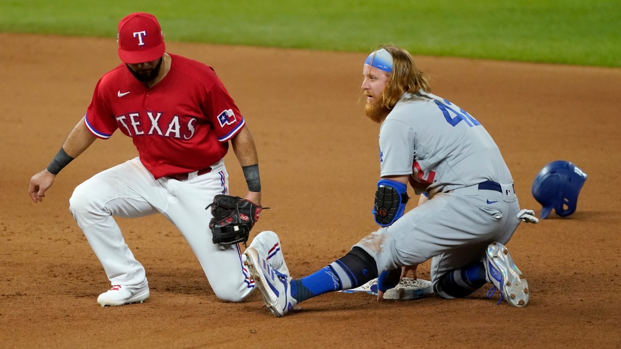 Los Angeles Dodgers third basemen Justin Turner throws the ball