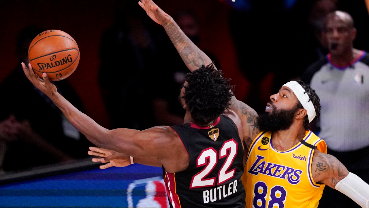 Miami Heat forward Jimmy Butler shoots over Los Angeles Lakers forward Markieff Morris. (Mark J. Terrill/AP)
