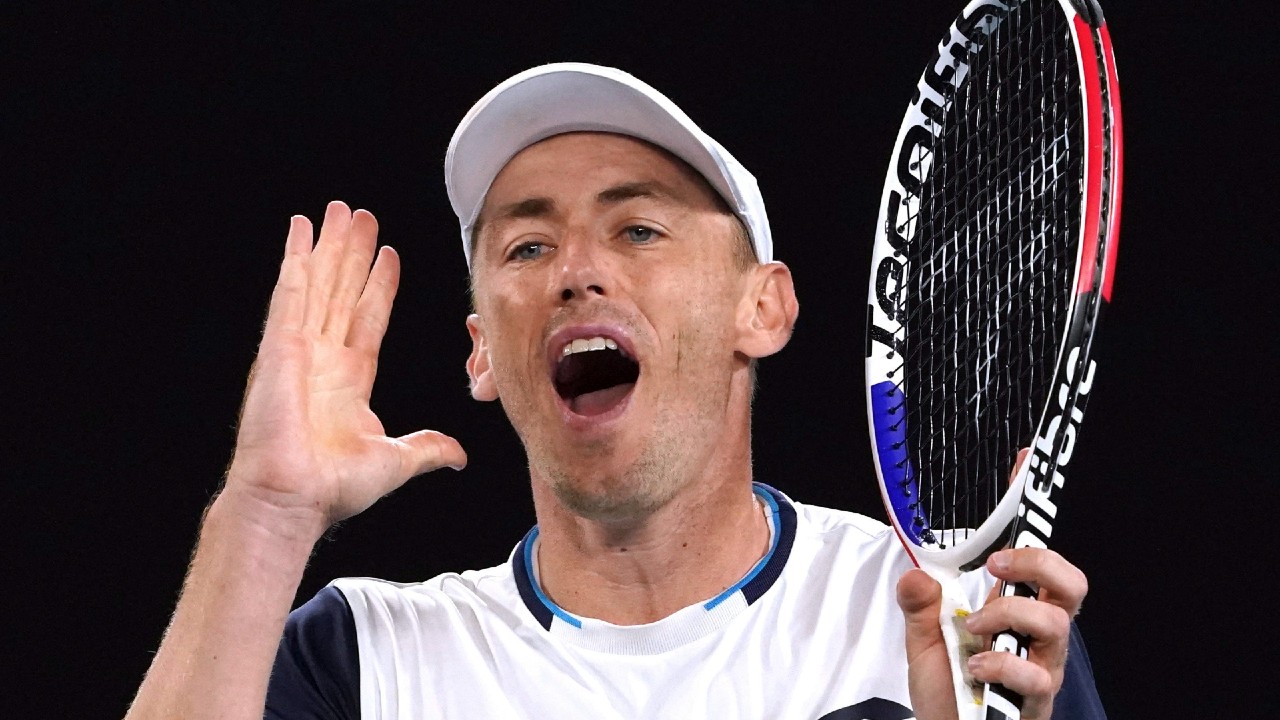 Australia's John Millman reacts during his third round match against Switzerland's Roger Federer at the Australian Open tennis championship in Melbourne, Australia, Friday, Jan. 24, 2020. (Lee Jin-man/AP)