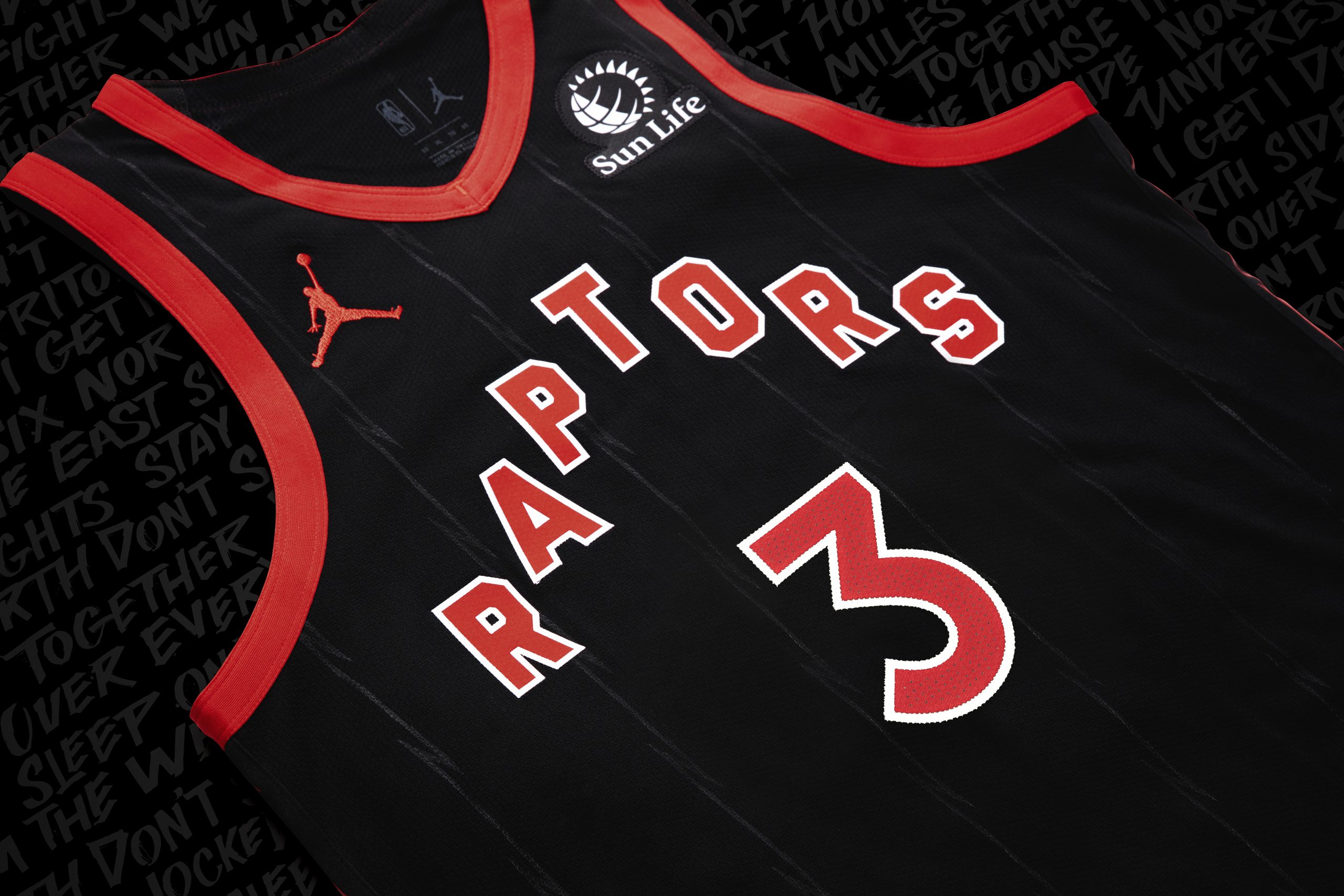 black and red raptors jersey