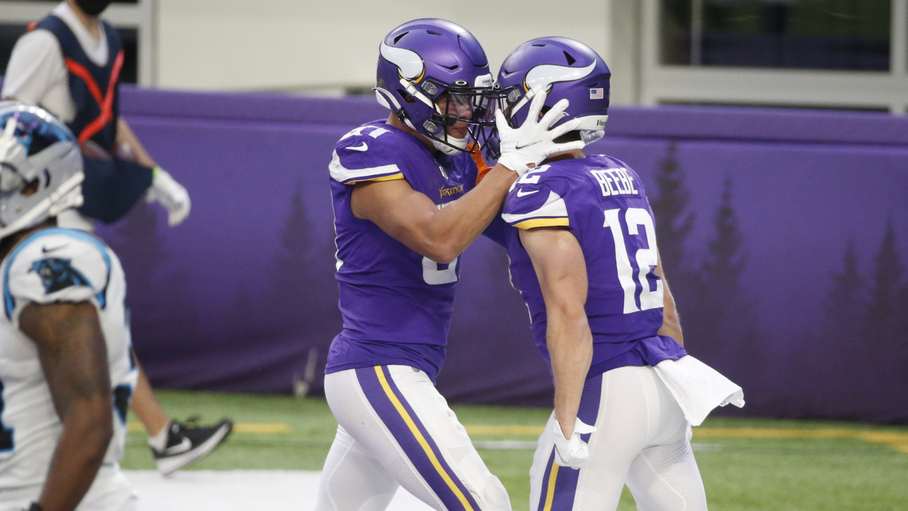 Carolina Panthers' Jeremy Chinn, left, tries unsuccessfully to