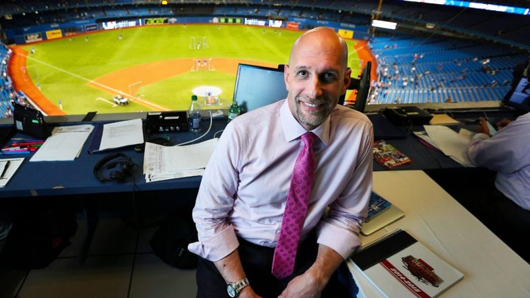 Sportsnet's Blue Jays broadcaster Dan Shulman in the booth at the Rogers Centre. (Richard Lautens/Toronto Star via Getty)