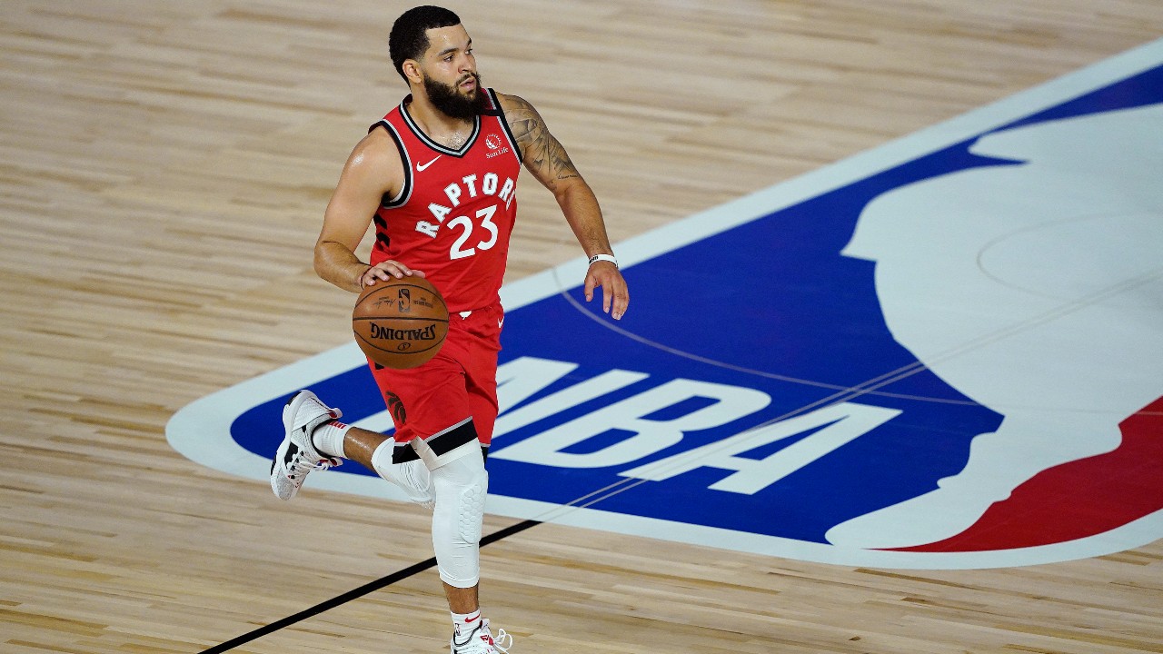 Toronto Raptors' Fred VanVleet (23) moves the ball up court against the Miami Heat during the first half of an NBA basketball game. (Ashley Landis, Pool, AP)