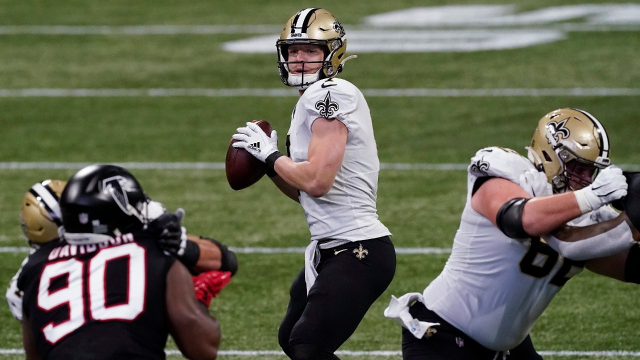 New Orleans Saints quarterback Taysom Hill throws a pass against