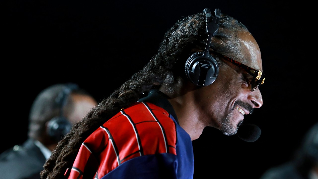 In a photo provided by Triller, Snoop Dogg performs onstage at an exhibition boxing bout between Mike Tyson and Roy Jones Jr. on Saturday, Nov. 28, 2020, in Los Angeles. (Joe Scarnici/Triller via AP)