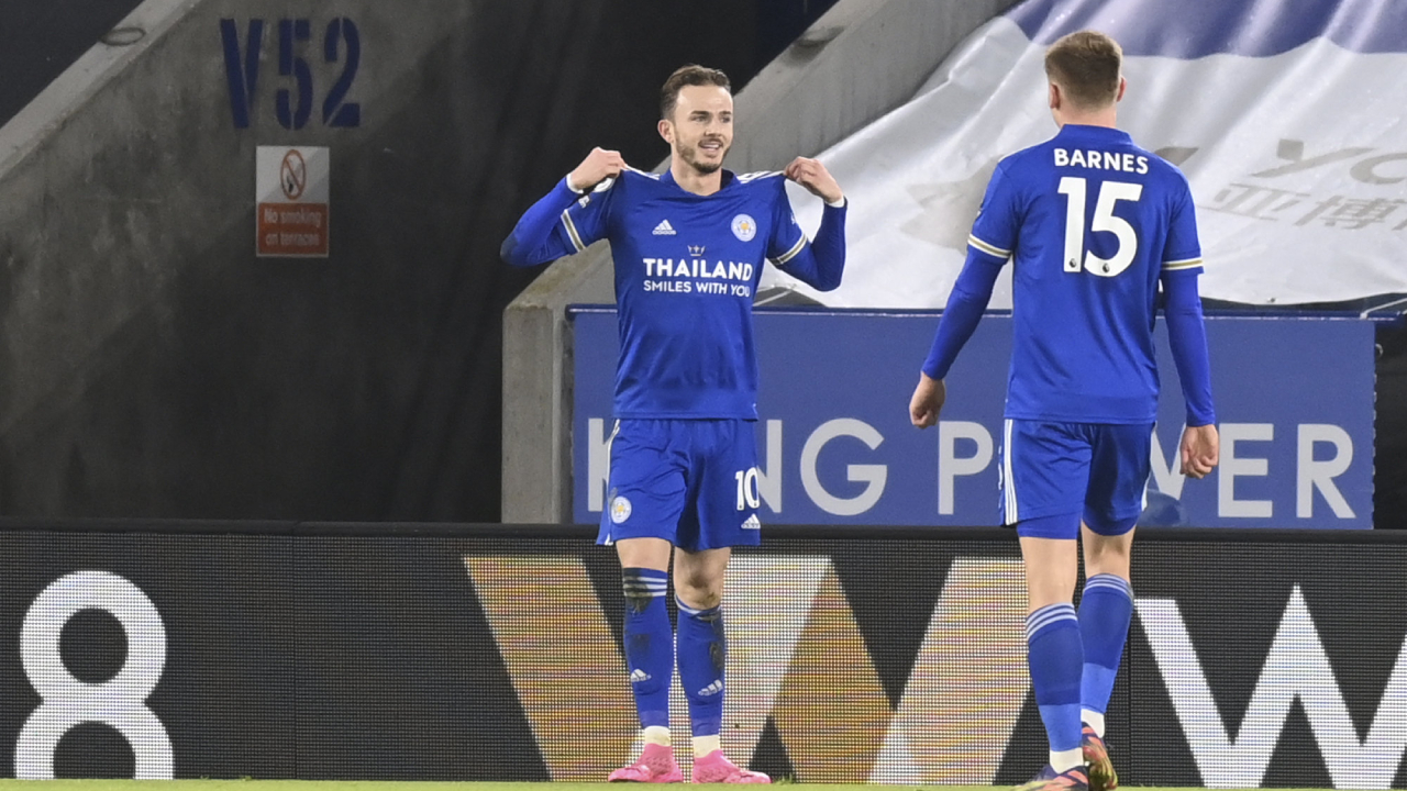 Leicester's James Maddison celebrates after scoring his team's second goal during the English Premier League soccer match between Leicester City and Chelsea at the King Power Stadium in Leicester, England, Tuesday, Jan. 19, 2021. (Michael Regan/Pool via AP)