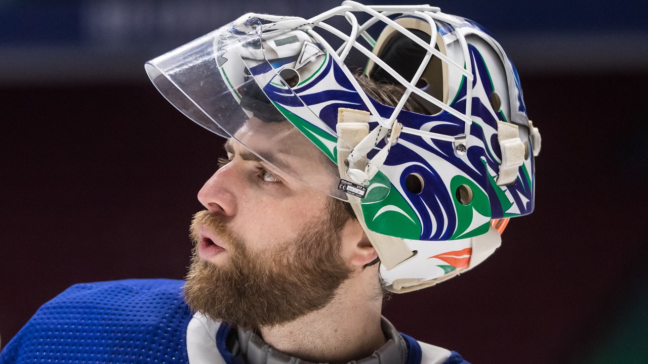 Vancouver Canucks goalie Braden Holtby looks on during a stoppage in play during the third period of an NHL hockey game against the Montreal Canadiens in Vancouver, on Saturday, January 23, 2021. (Darryl Dyck / CP)