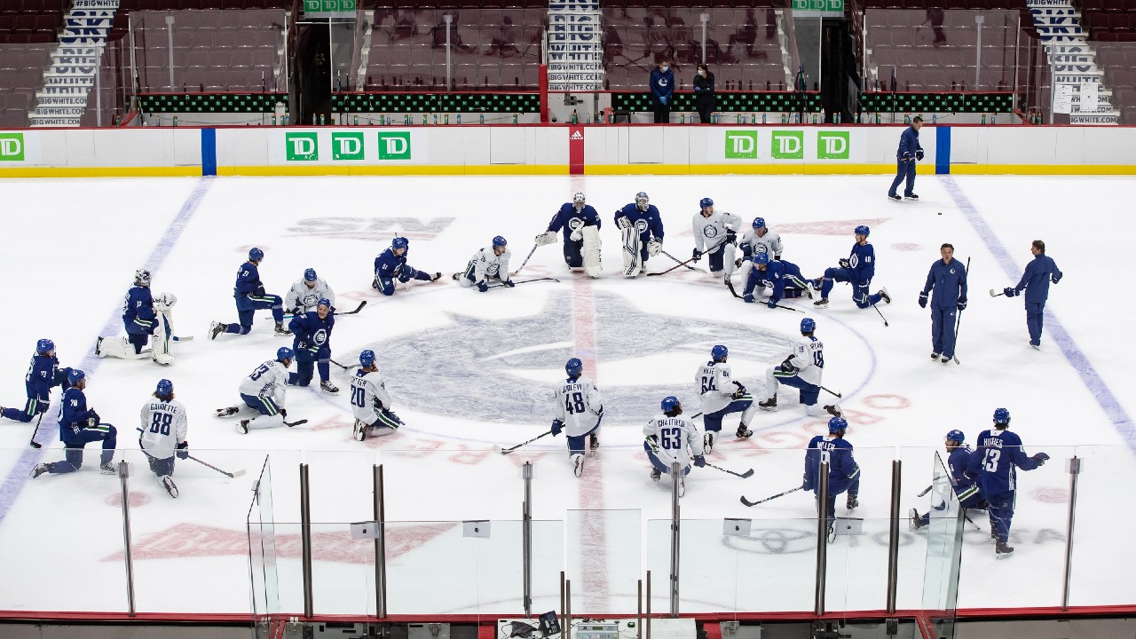 Vancouver Canucks players at practice. (Darryl Dyck/CP)