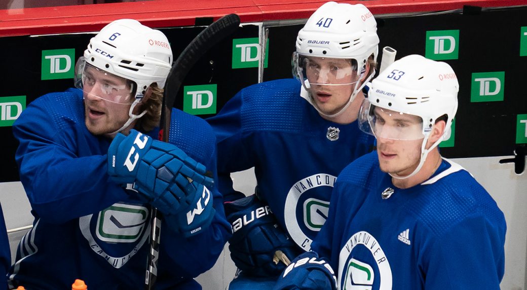 Canucks' new era of leadership begins as Pettersson and Hughes don A's