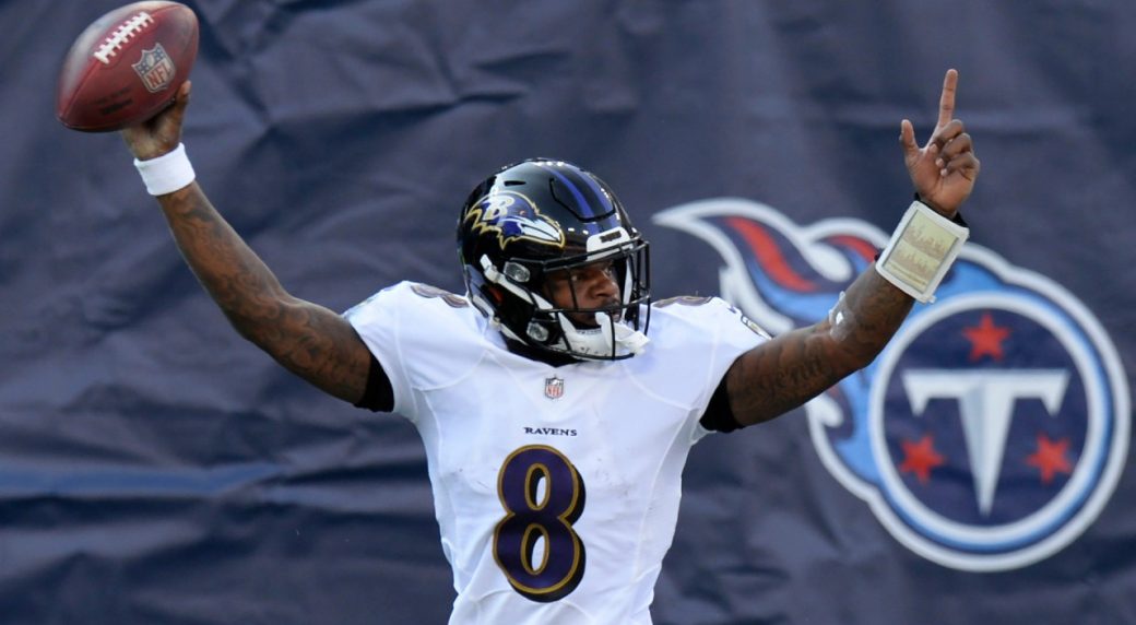 Lamar Jackson Leads Ravens Past Titans For First Playoff Victory
