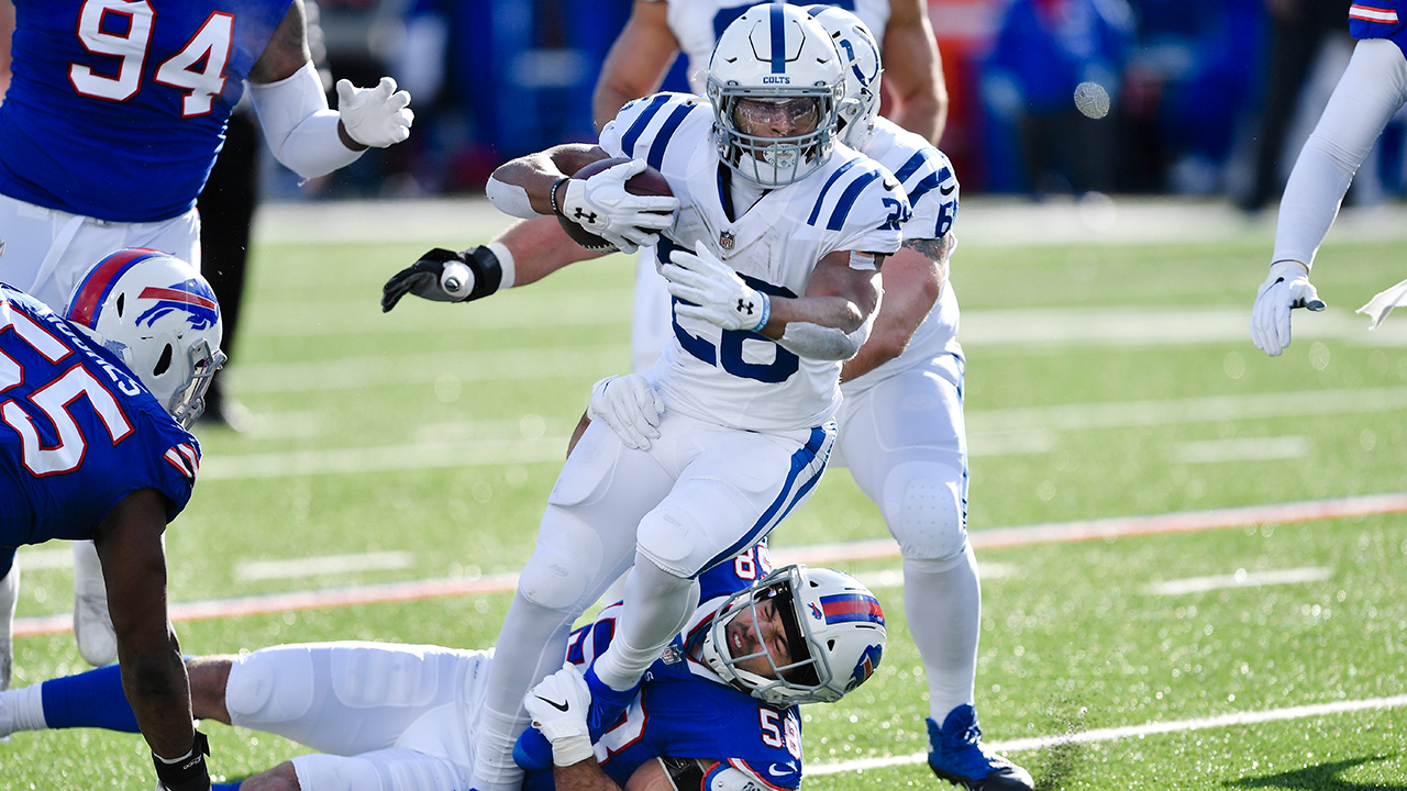 Taylor runs up the score with 5 TDs; Colts beat Bills 41-15